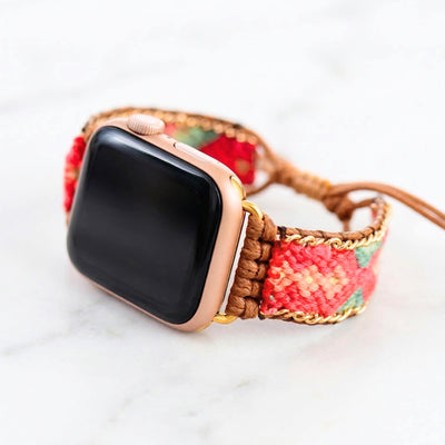Coral pink woven Apple Watch band with teal detail, boho smartwatch strap, adjustable waxed cord bracelet in gold tone