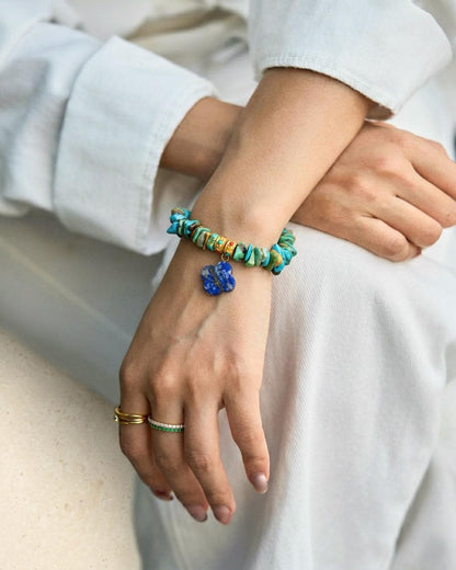 Turquoise chip bracelet with lapis lazuli clover charm, blue stone stretch bracelet in gold tone, boho everyday jewelry gift