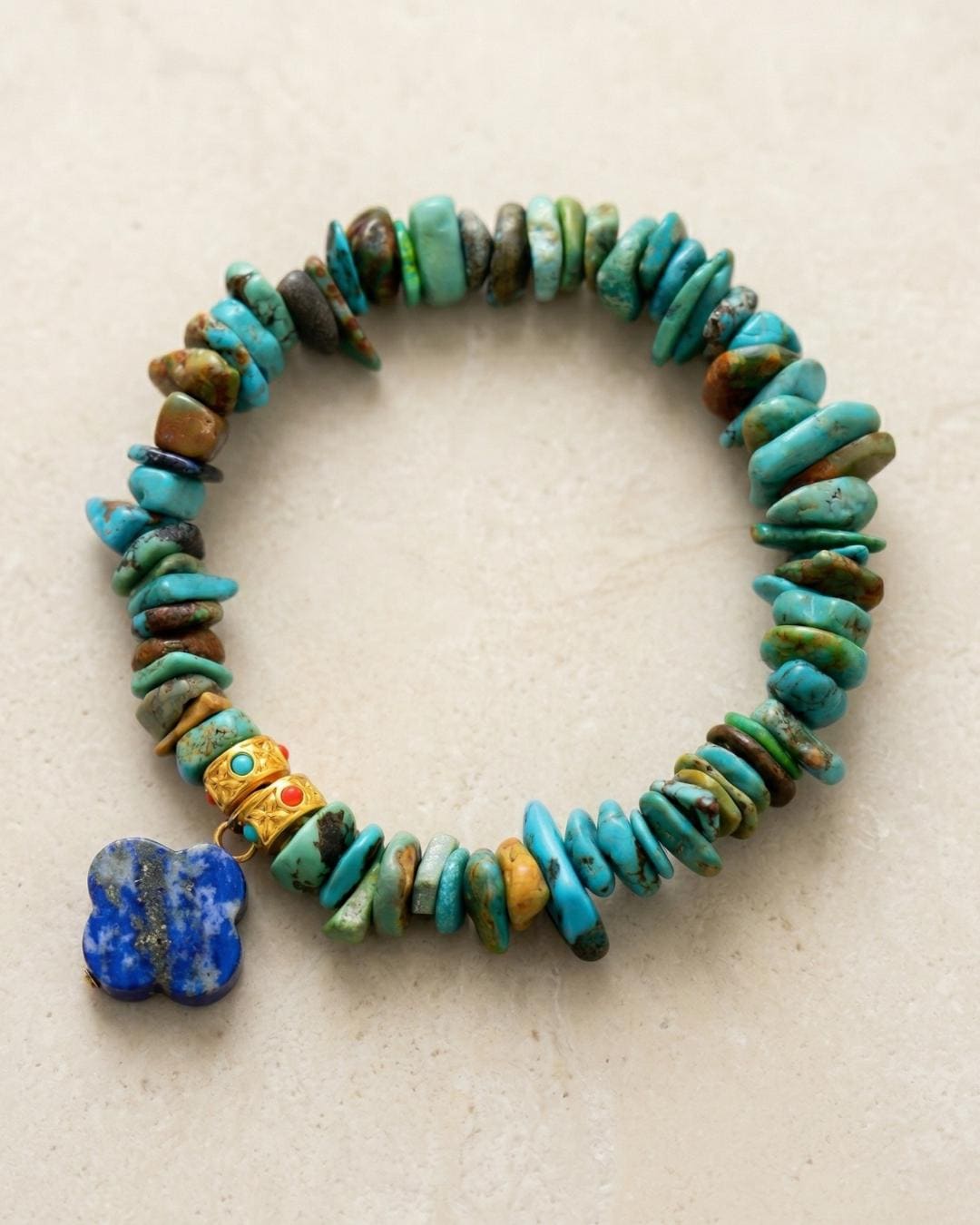 Turquoise chip bracelet with lapis lazuli clover charm, blue stone stretch bracelet in gold tone, boho everyday jewelry gift